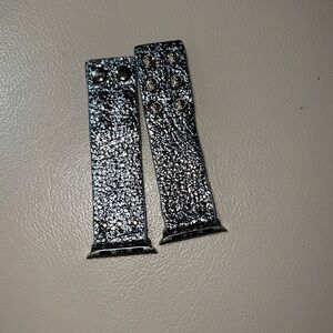 Silver and black. Shiny adjustable watch band